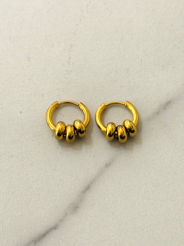 Boucles d'oreilles créoles avec trois boules amovibles: Or