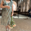 Robe en voile de soie imprimée et plumetis doré de chez Louise Misha à louer sûr en-boucle